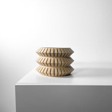 Wavy Disc Planter