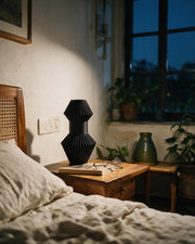 Angular Fin Vase – at night on a bedside table