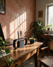 Arch Desk Holder – on a work desk in morning sun