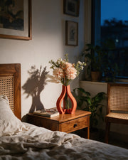 Arch Frame Vase – at night on a bedside table