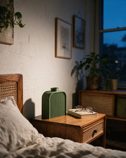 Arch Slab Vase – at night on a bedside table