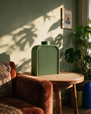 Arch Slab Vase – on a side table at golden hour