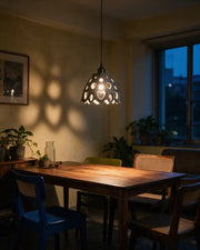 Bloom Cell Pendant Light – at night on a bedside table
