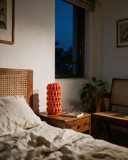 Bubble Column Vase – at night on a bedside table