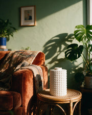 Bubble Dot Vase – on a side table at golden hour