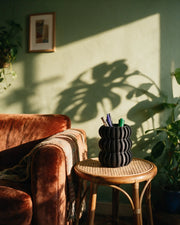 Bubble Ring Pen Cup – on a side table at golden hour