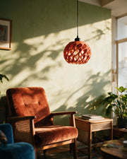 Cell Orb Pendant Light – on a side table at golden hour