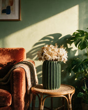Chevron Fin Vase – on a side table at golden hour