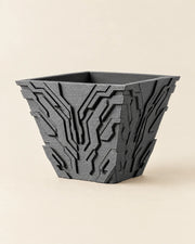 Circuit Relief Planter – three-quarter studio view