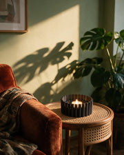 Comb Tealight Holder – on a side table at golden hour