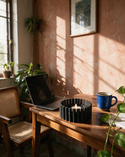 Comb Tealight Holder – on a work desk in morning sun