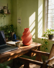 Coral Twist Vase – on a work desk in morning sun