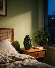 Diamond Oval Vase – at night on a bedside table