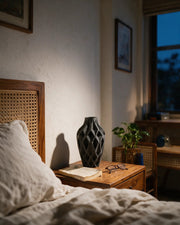 Diamond Tower Vase – at night on a bedside table