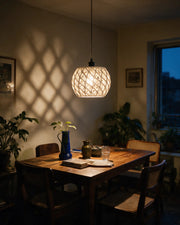 Diamond Weave Pendant Light – at night on a bedside table