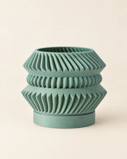 Disc Stack Planter – three-quarter studio view