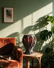 Ember Web Planter – on a side table at golden hour