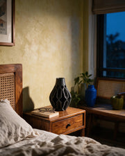 Facet Fin Vase – at night on a bedside table