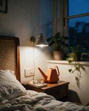 Facet Watering Can – at night on a bedside table