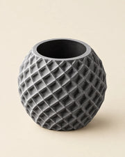 Faceted Orb Planter – three-quarter studio view