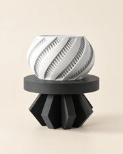 Faceted Plinth Plant Stand – three-quarter studio view