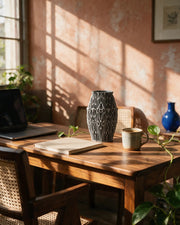 Filigree Web Vase – on a work desk in morning sun