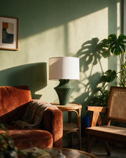Fin Hourglass Table Lamp – on a side table at golden hour