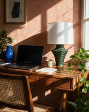 Fin Hourglass Table Lamp – on a work desk in morning sun