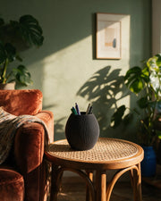 Fine Rib Pen Cup – on a side table at golden hour