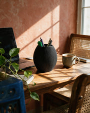 Fine Rib Pen Cup – on a work desk in morning sun