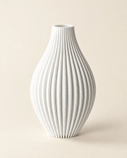 Fine Rib Teardrop Vase – three-quarter studio view