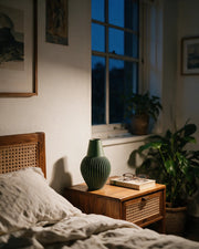 Fine Rib Vase – at night on a bedside table