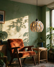 Flame Blade Pendant Light – on a side table at golden hour