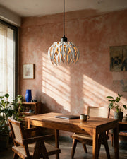 Flame Blade Pendant Light – on a work desk in morning sun
