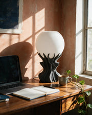 Flame Globe Table Lamp – on a work desk in morning sun