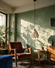 Flame Petal Pendant Light – on a side table at golden hour