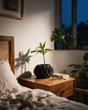 Flame Relief Planter – at night on a bedside table