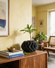 Flame Relief Planter – styled on a console