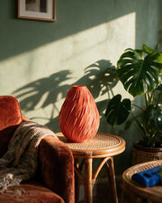 Flame Swirl Vase – on a side table at golden hour