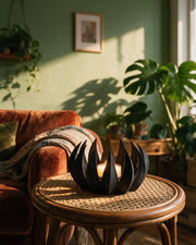 Flame Tealight Holder – on a side table at golden hour