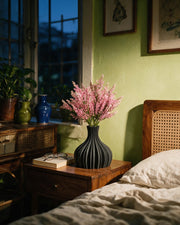 Fluted Bulb Vase – at night on a bedside table