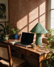 Fluted Mushroom Table Lamp – on a work desk in morning sun