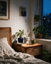 Fluted Pedestal Planter – at night on a bedside table