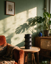 Gear Disc Vase – on a side table at golden hour