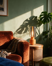 Glass Tube Table Lamp – on a side table at golden hour