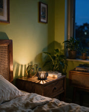 Hex Tealight Holder – at night on a bedside table