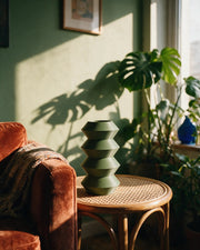 Hex Tier Vase – on a side table at golden hour