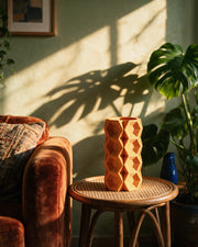 Hex Tile Vase – on a side table at golden hour