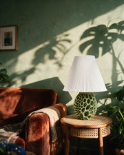 Honeycomb Base Table Lamp – on a side table at golden hour