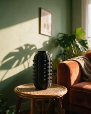 Knob Capsule Vase – on a side table at golden hour
